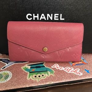Louis Vuitton Sarah Empreinte wallet.